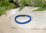 Schlangenprint metallic blau