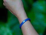 Schlangenprint metallic blau